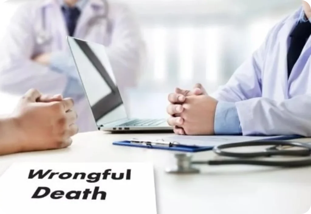 People discussing with a "Wrongful Death" document and laptop.