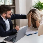 Attorney comforting grieving client during wrongful death compensation