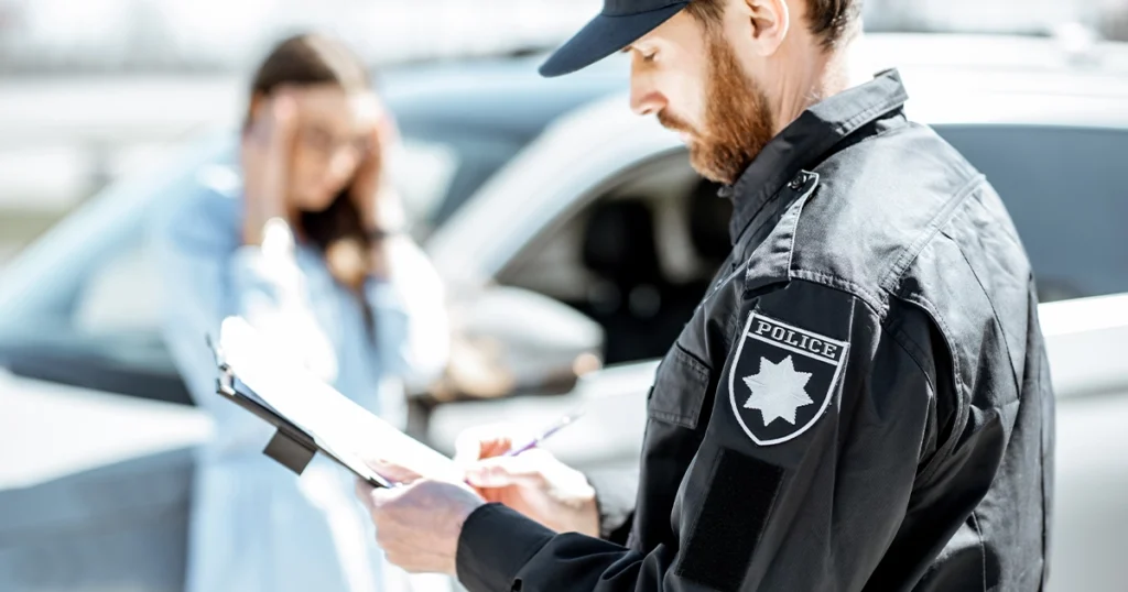 Officer documenting a violation that stays on Texas records.
