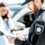 Officer documenting a violation that stays on Texas records.